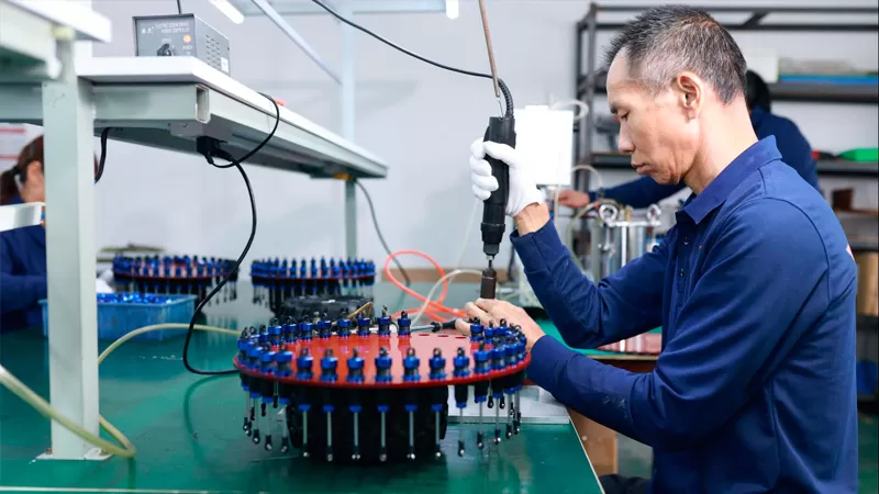 Squadra di produzione di pezzi di ricambio